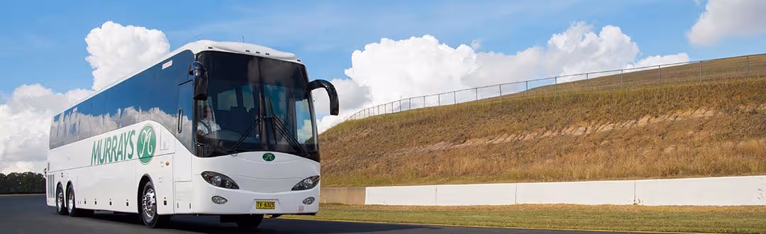 Image of a Murrays Coach on a road.